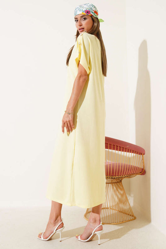 Robe midi jaune à boutons aux épaules