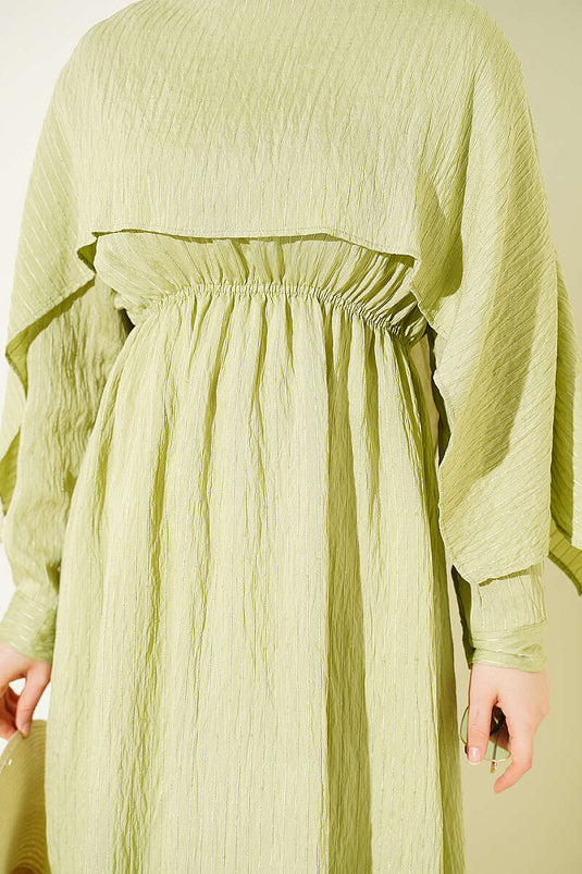 Robe à détails pailletés avec cape épaule en vert avocat