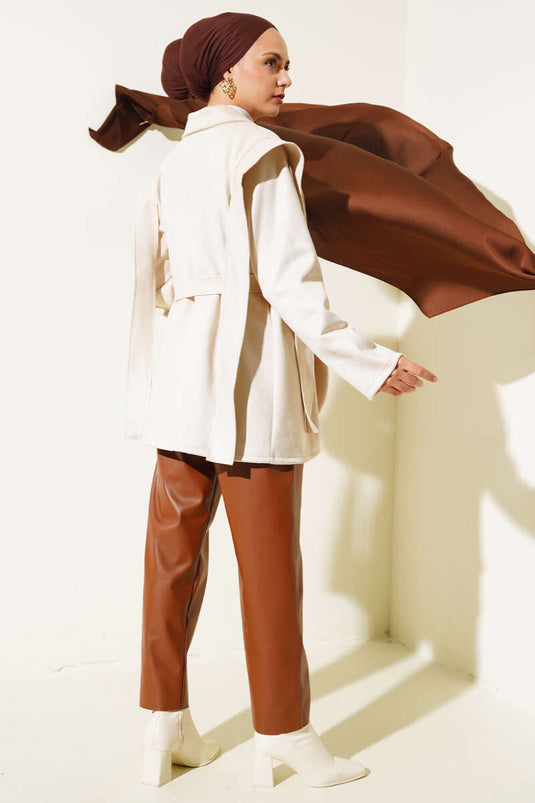 Veste en daim beige avec cape d'épaule