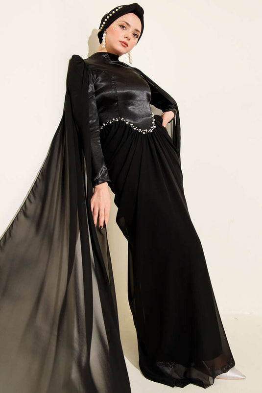 Abito da sera con spalle scoperte e dettagli in pietra, nero