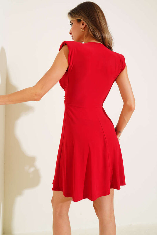 Rode mini-jurk met schoudervullingen