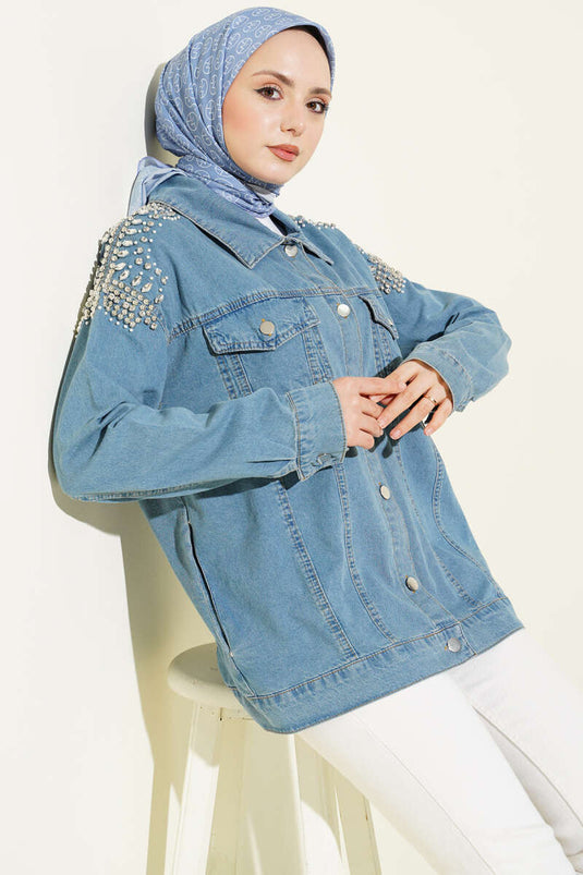 Veste en jean bleu denim avec poches et épaulettes ornées de pierres