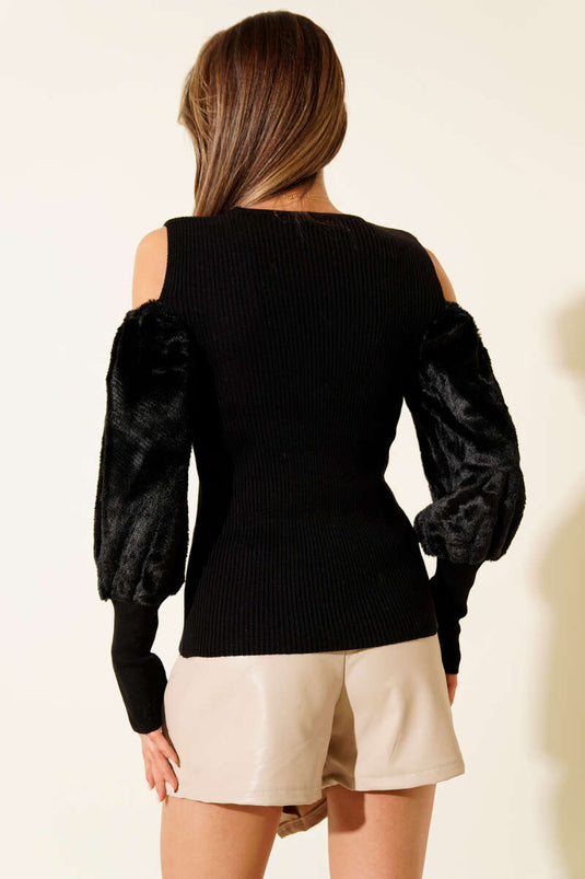 Off-the-shoulder, bearded sweater, black.