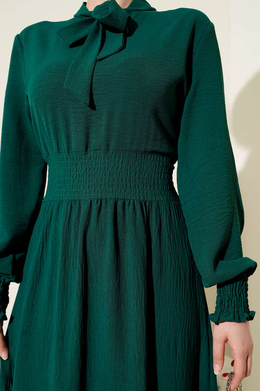 Robe élastique avec détail noué sur le devant, couleur émeraude