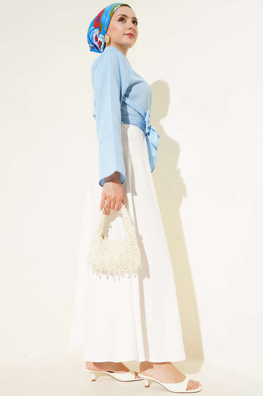 Chemise courte nouée devant bleue