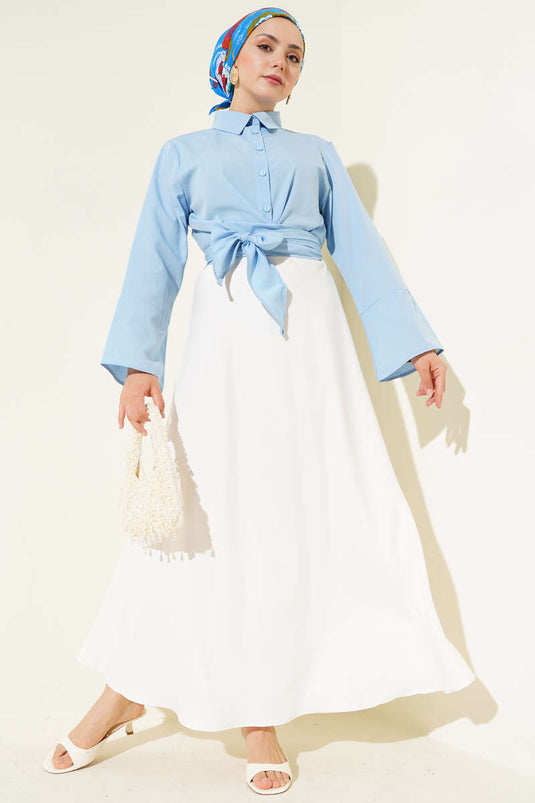 Chemise courte nouée devant bleue