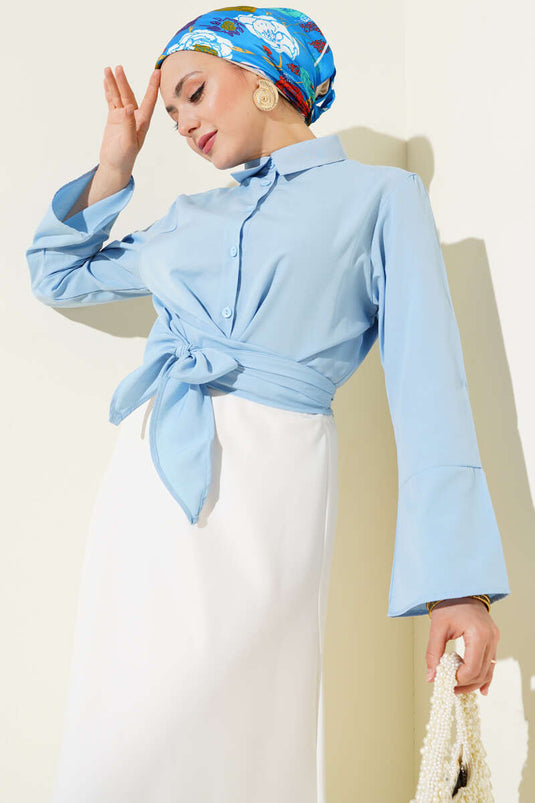 Chemise courte nouée devant bleue