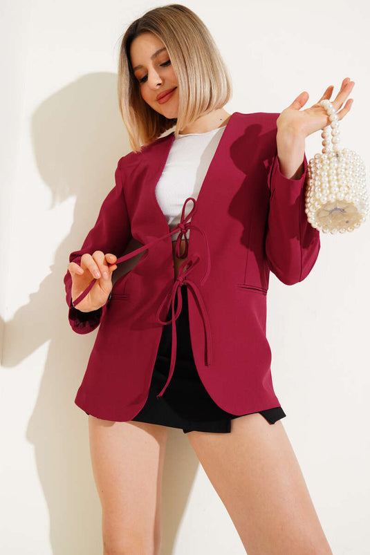 Veste doublée bordeaux à nouer sur le devant