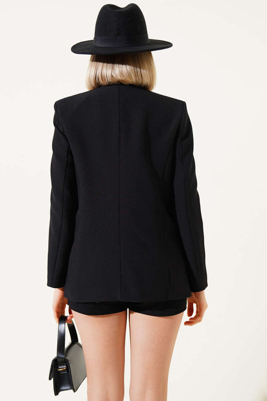 Veste noire doublée à nouer sur le devant