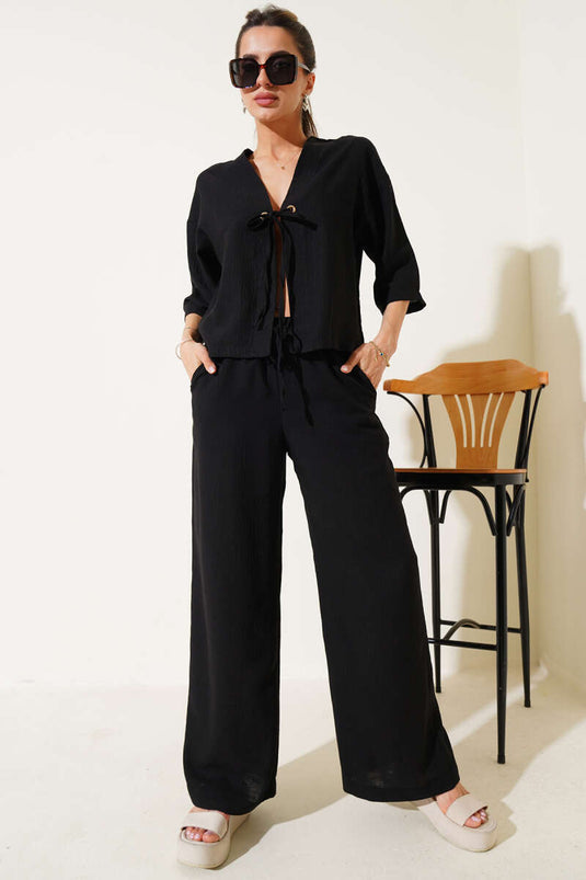 Tweedelige set met strik aan de voorkant en halve mouwen, zwart