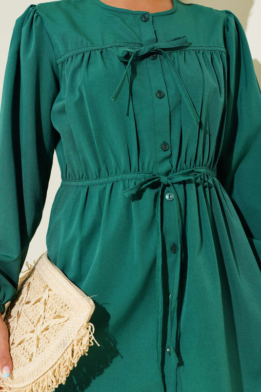 Groen shirt met trekkoord en kant aan de voorkant