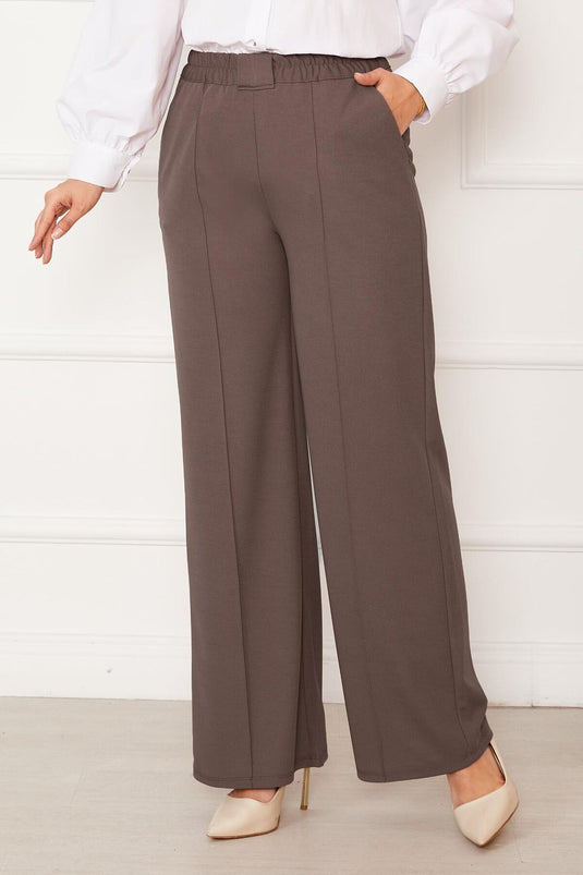 بنطلون من جلد المنك بجيوب أمامية من العشب