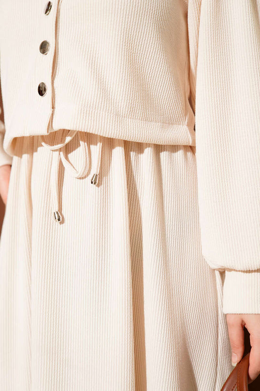 Costume deux pièces boutonné, beige