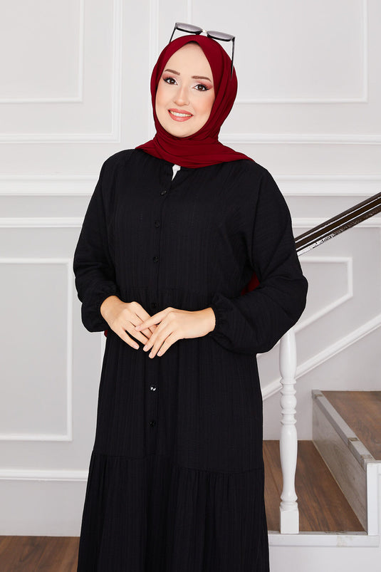 فستان محتشم أسود بطبقات وأزرار أمامية