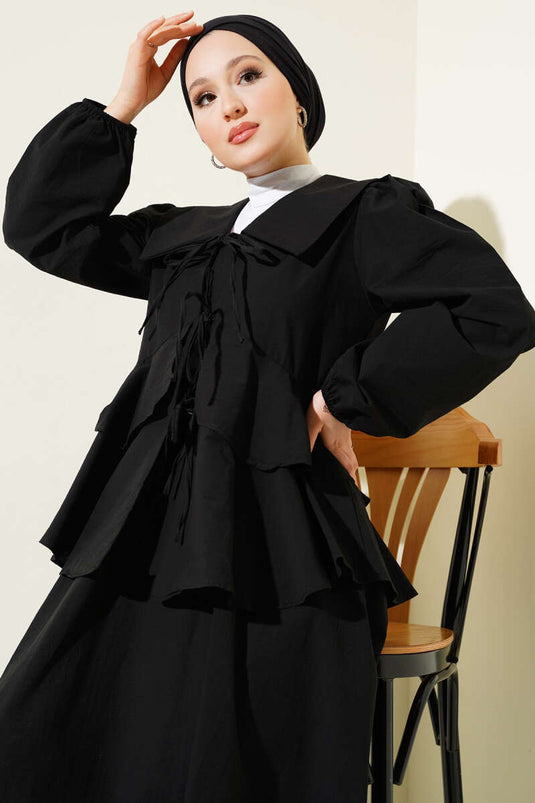 طقم بلوزة وتنورة مربوطة بحبل أمامي من قطعتين باللون الأسود