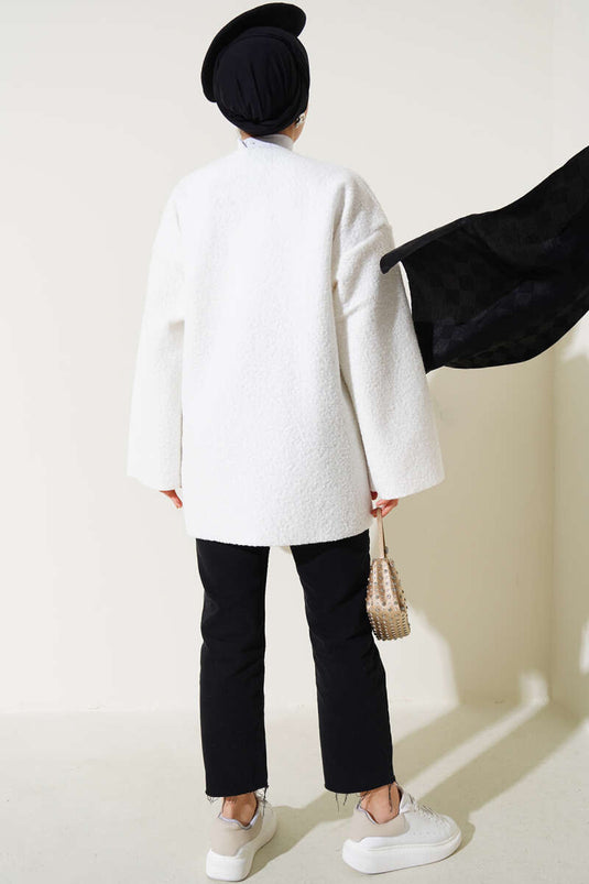 Veste bouclée écrue à ruban sur le devant