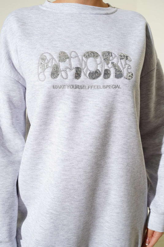 Tunique grise à trois fils avec broderie avant