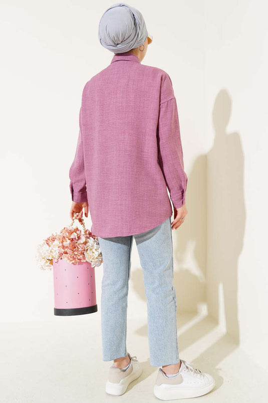 قميص بتفاصيل الترتر على الجهة الأمامية، لون وردي باهت