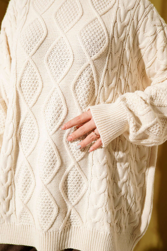 سترة محبوكة باللون البيج