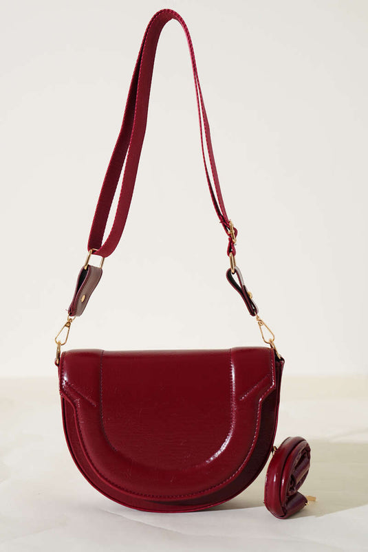 Sac ovale bordeaux à détails de surpiqûres