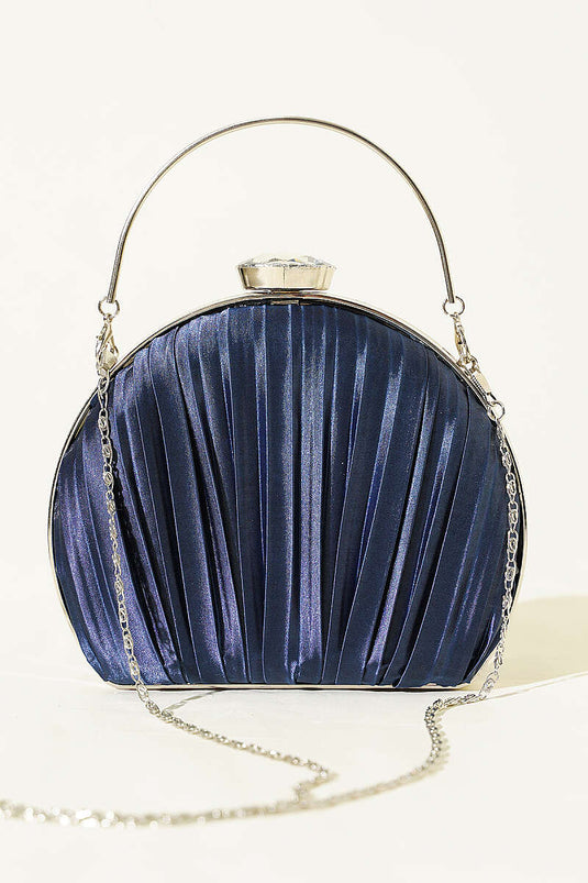 Sac de soirée plissé ovale en satin bleu marine