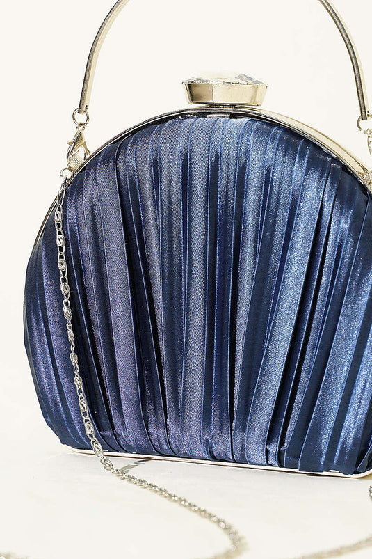 Sac de soirée plissé ovale en satin bleu marine