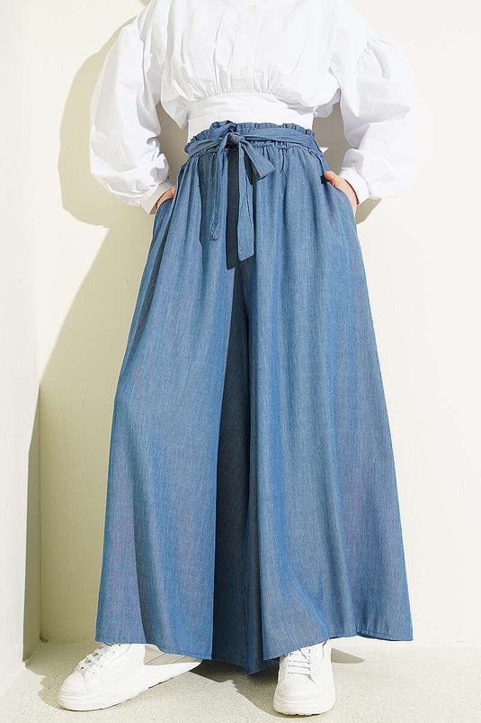 Pantaloni oversize con risvolto e cintura indaco