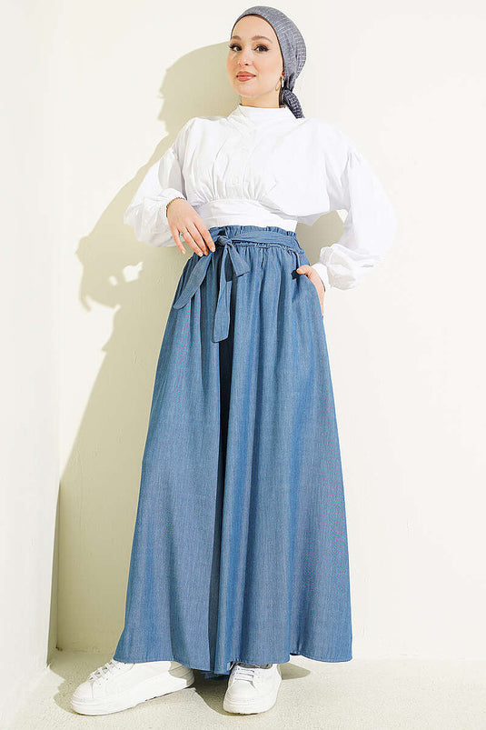 Pantaloni oversize con risvolto e cintura indaco