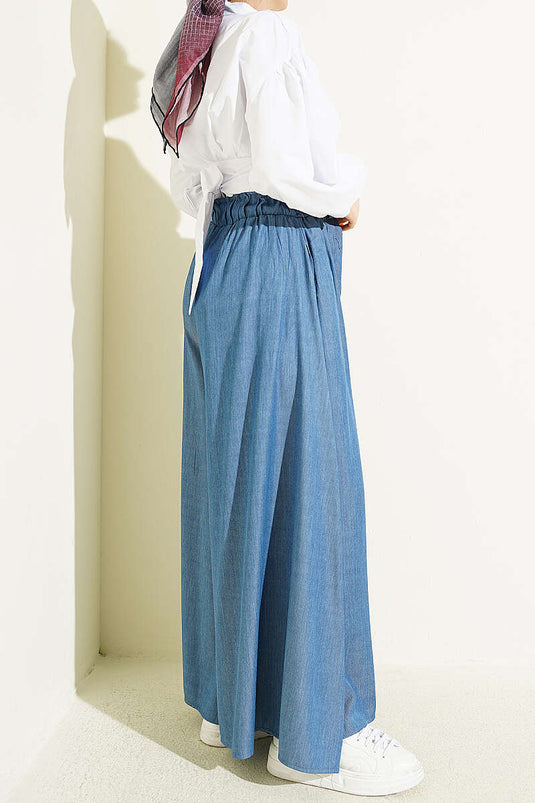 Pantaloni oversize con risvolto e cintura indaco