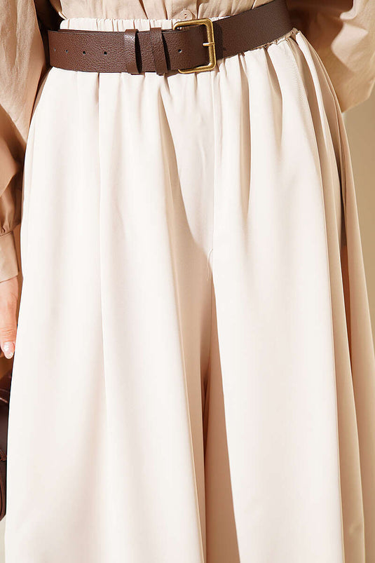 Oversized broek met elastische taille en zoom in steen kleur