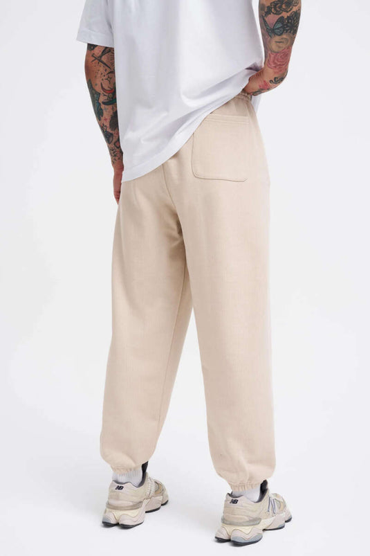Pantalon de jogging pour homme avec poches et taille élastiquée beige