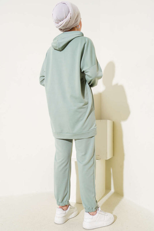 بدلة من قطعتين بغطاء رأس وأرجل مرنة، لون أخضر لوزي