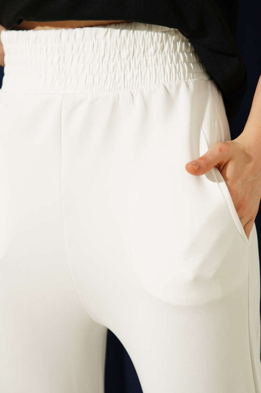 Pantalon en scuba blanc avec poches à pince et taille élastiquée