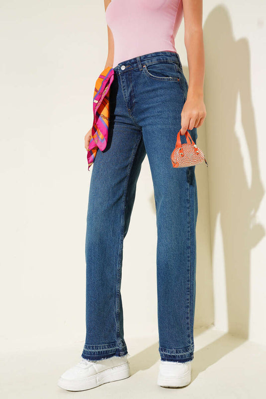 Vaqueros de mezclilla con detalle de borlas en el dobladillo, azul