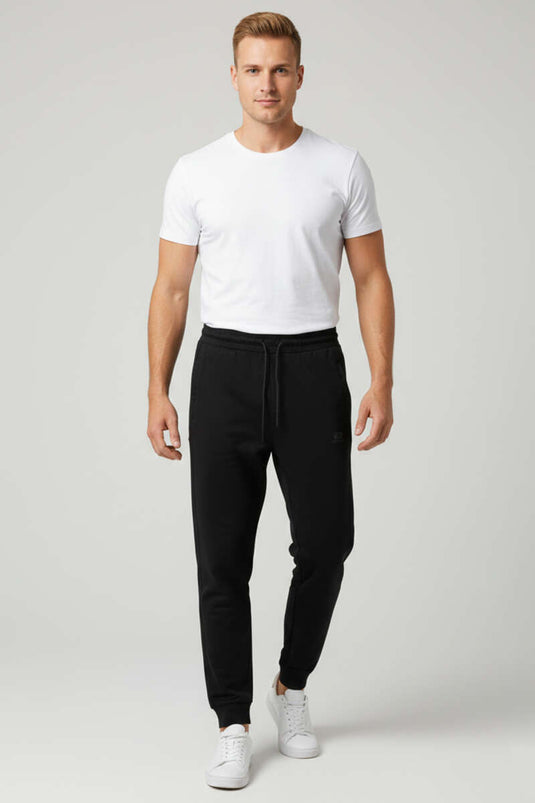 Pantalon de survêtement pour homme avec poches et bord-côte aux chevilles, noir