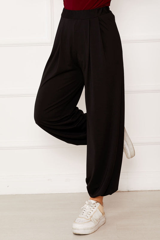 بنطلون شالوار أسود مريح بقصّة مريحة وساق مرنة