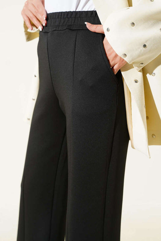 بنطال غوص أسود اللون بفتحة في الحافة