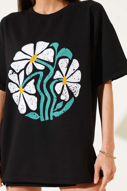 Schwarzes T-Shirt mit Gänseblümchenmuster