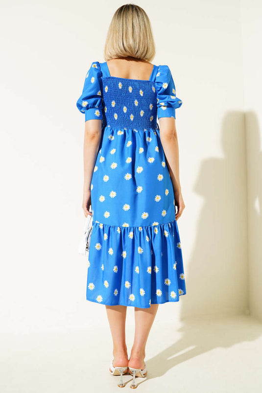Robe midi bleue à motif marguerites