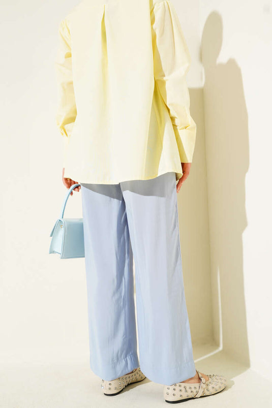 Pantalon en tissu aspect brillant bleu bébé