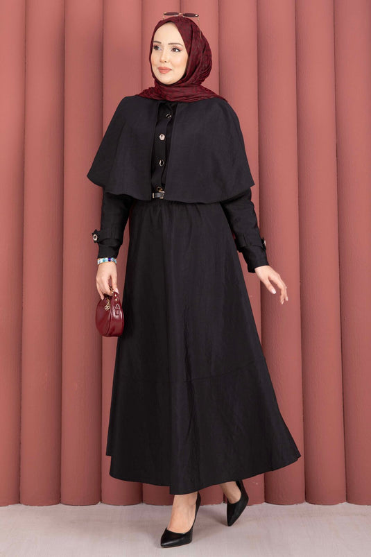 Conjunto de dos piezas con falda y hombreras con capa en negro
