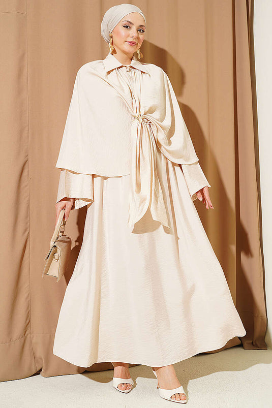 Ensemble triple avec jupe à pèlerine beige