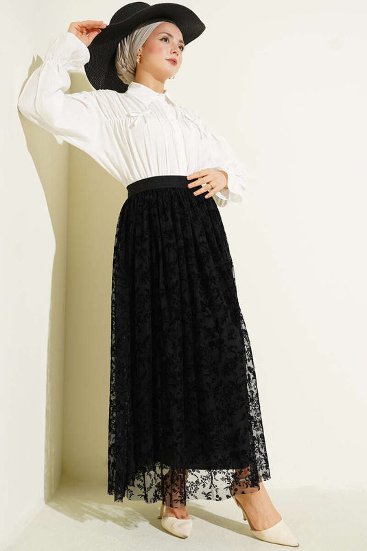 Jupe noire en tulle à fleurs avec détails en relief