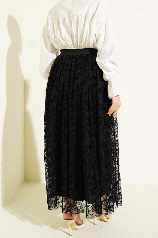 Jupe noire en tulle à fleurs avec détails en relief