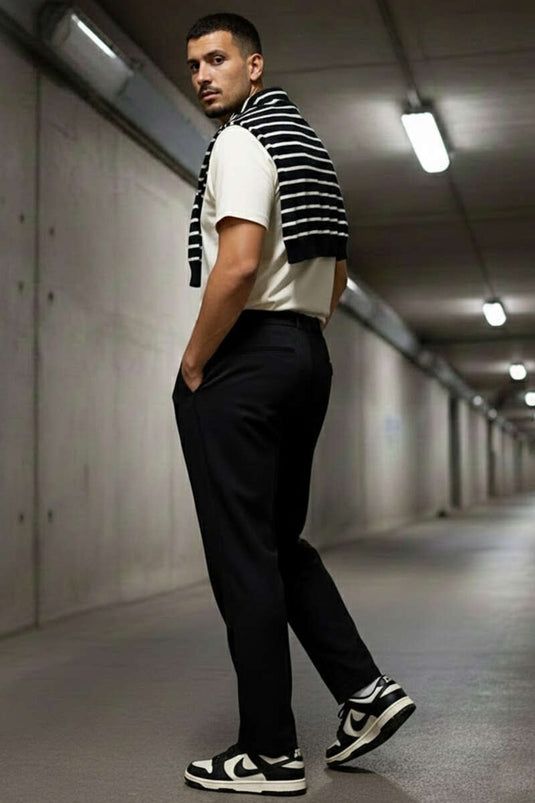 Met zakken en elastische tailleband losse herenbroek zwart