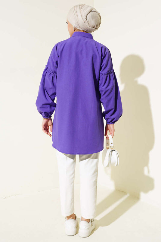 قميص مطوي مطرز بالزهور باللون الأرجواني