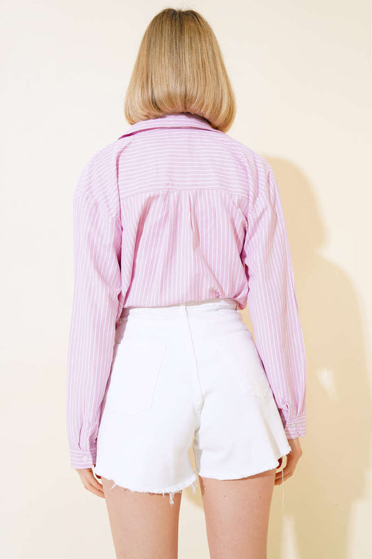 مطوي الساق شرابة الدنيم السراويل البيضاء