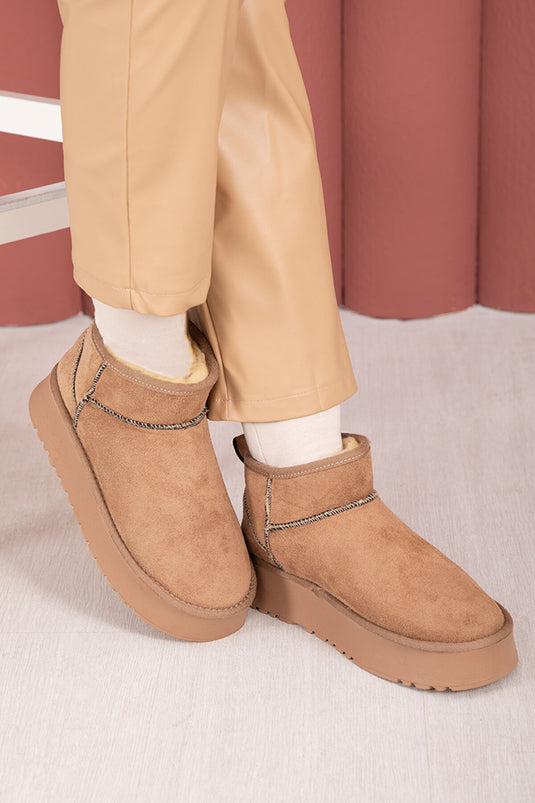 Bottes à semelle compensée doublées de fourrure, vison