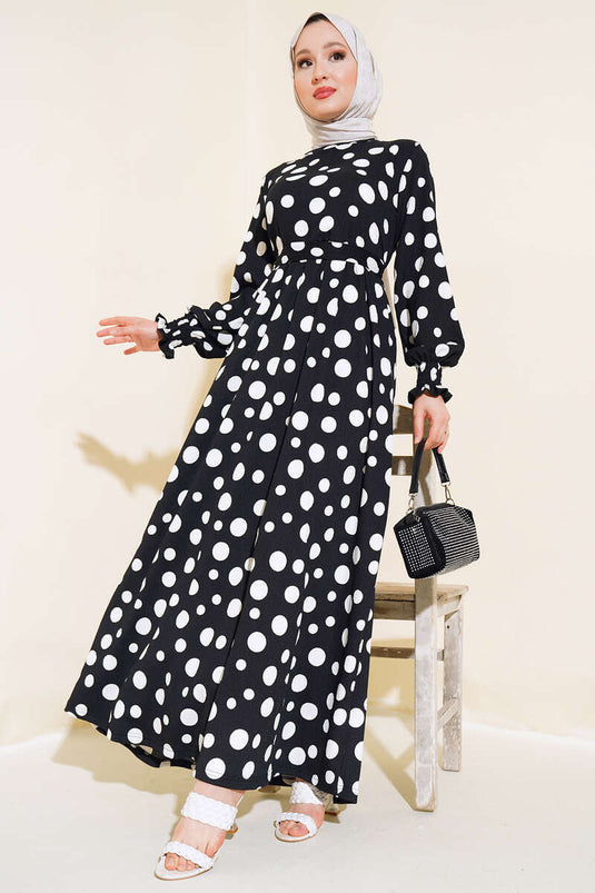 فستان ملفوف بنمط منقط باللون الأسود