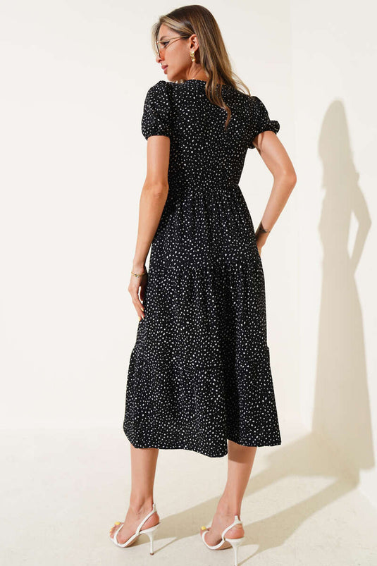 Schwarzes Midikleid mit Polka-Dots, elastischem Bund und V-Ausschnitt